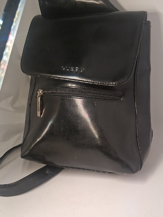 Guess Handbags - GUESS Black Faux Leather Mini Backpack with Silver Hardware